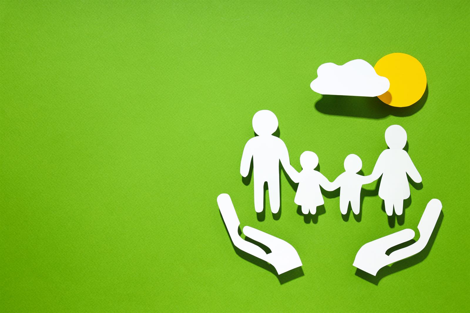 Wills and estate planning services in South Africa — a paper-cutout family sheltered by protective hands, representing inheritance planning